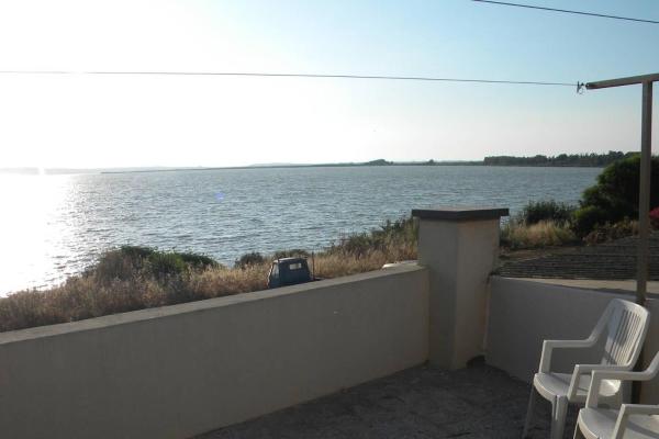 A la foto es mostra l'objecte Casa dei pescatori sulla laguna situat a la ciutat de Càbras.