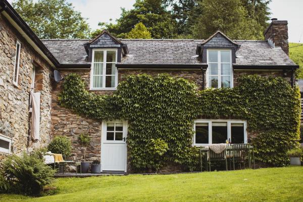 La photo montre l'objet River Cottage, a luxurious and cosy riverside cottage for two situé dans la ville de Welshpool.