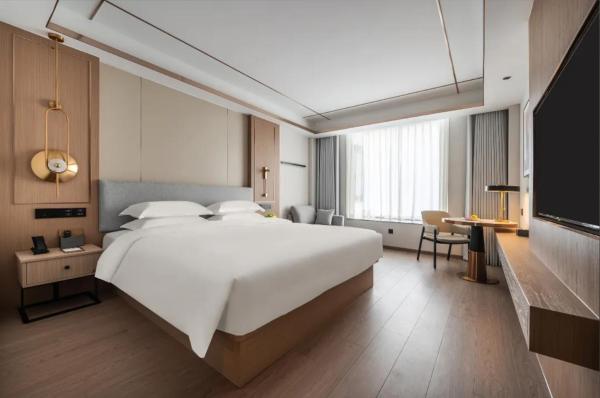 Op de foto is het object Poltton Grand Century Hotel te zien, gelegen in de stad Yanxi.