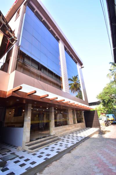 På bilden syns objektet Hotel orchid suites Cochin som ligger i staden Ernakulam.