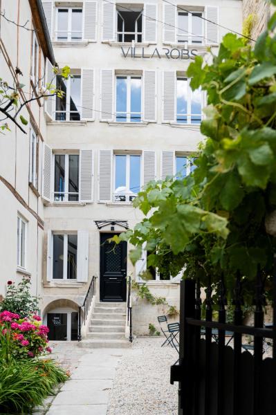 A la foto es mostra l'objecte Villa Robs - Appartements tout confort, TV connectée, Haut débit, Localisation idéale - Courts séjours & Affaires - Arrivée autonome - Pas d'ascenseur situat a la ciutat de Caen.