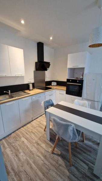 A la foto es mostra l'objecte Appartement DMV situat a la ciutat de Bécherel.