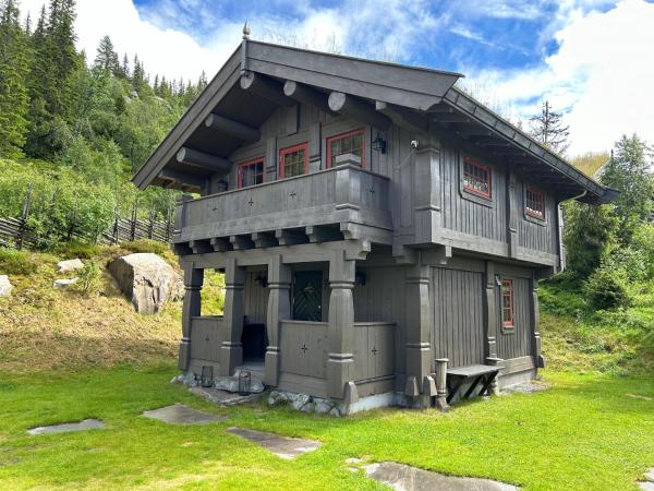 На фото показан объект Eventyrtunet in idyllic Tuddal, расположенный в городе Hjartdal.