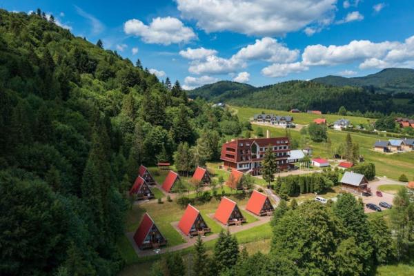 Na fotografii je vidět objekt Perełka Bieszczady Domki nacházející se ve městě Cisna.