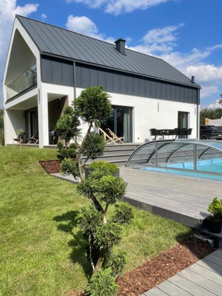 A la foto es mostra l'objecte Luxury House Masuria situat a la ciutat de Wikno.