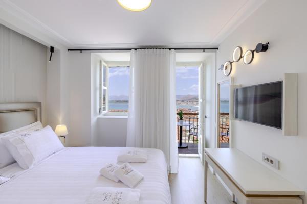 A la foto es mostra l'objecte Nafplion Comfy Suites situat a la ciutat de Nàuplia.
