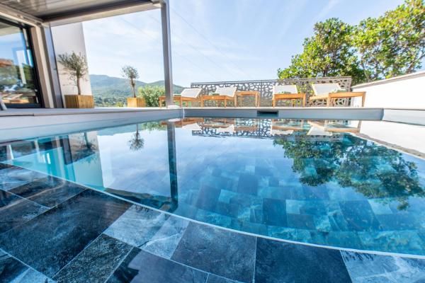 Na fotografii je vidět objekt NOUVEAUTÉ ! Magnifique villa de standing avec piscine, entre mer et montagnes, à 3 minutes des plus belles plages de la rive sud nacházející se ve městě Molini.