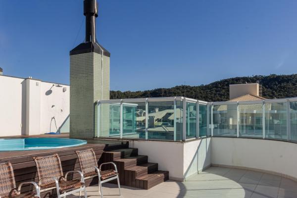 På billedet ses objektet Cobertura 4 suítes, Piscina Privada Ingleses ING35 beliggende i byen Florianópolis.