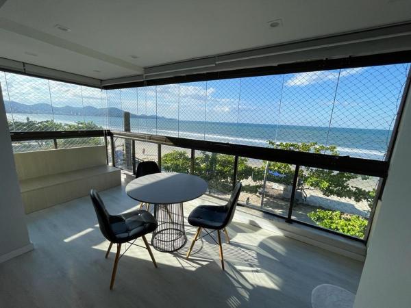 A la foto es mostra l'objecte Lindo frente mar bem localizado situat a la ciutat de Itapema.