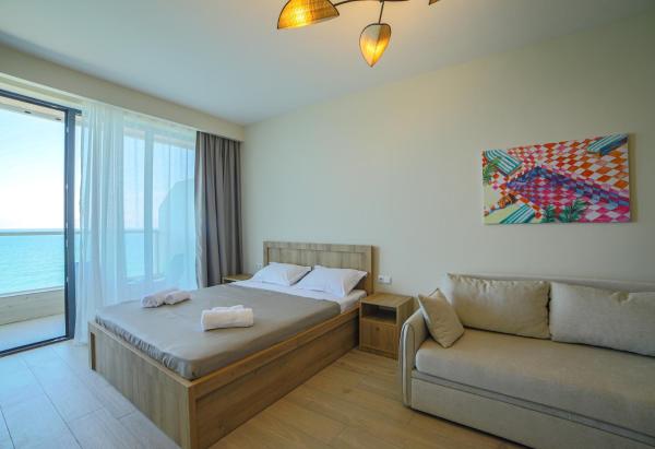 A la foto es mostra l'objecte Cozy, comfortable apartment at Bamboo Beach Tsikhisdziri situat a la ciutat de Kobuleti.