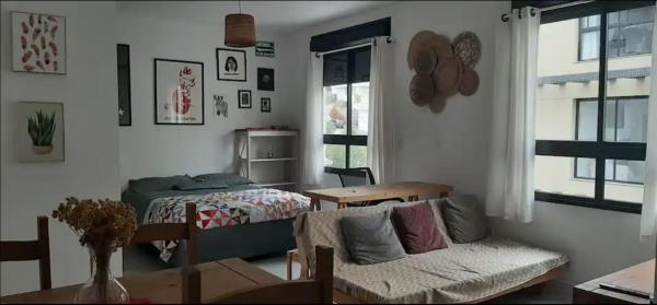 På billedet ses objektet Studio aconchegante ao lado da UFSC beliggende i byen Florianópolis.