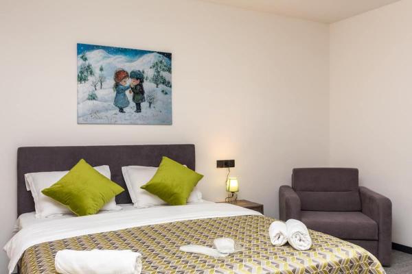 A la foto es mostra l'objecte Mitarbi Ski Apartment situat a la ciutat de Bakuriani.