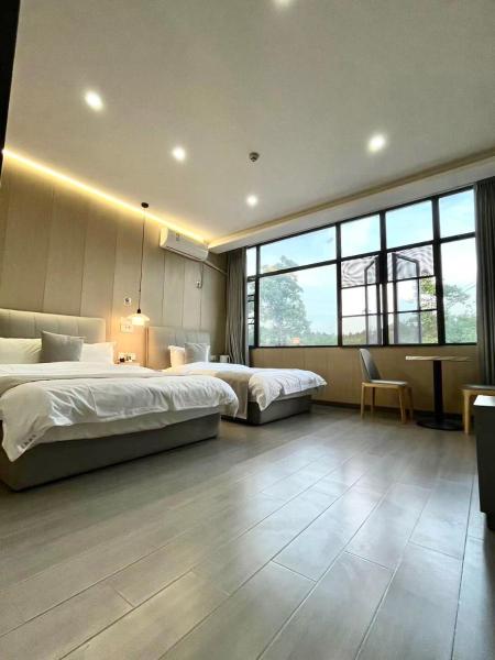 На фото показан объект Jinyang Xinyi Hotel - Tianfu International Airport, расположенный в городе Caochi.