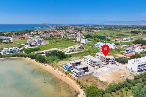 Na fotografii je vidět objekt Apartments by the sea Privlaka, Zadar - 23479 nacházející se ve městě Privlaka.