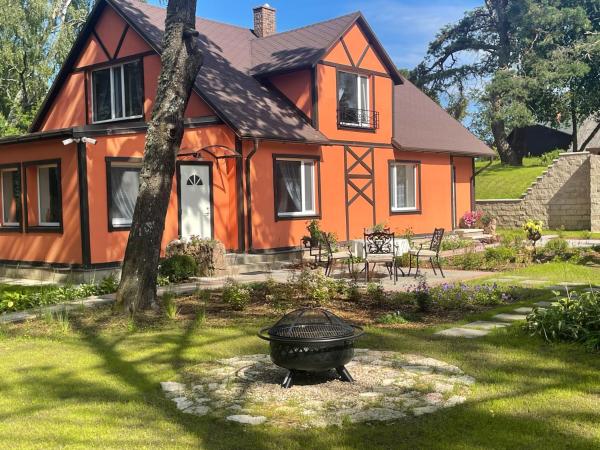 Στη φωτογραφία φαίνεται το αντικείμενο More Holiday Cottage M, 85 meters to the beach with large garden που βρίσκεται στην πόλη Bigauņciems.