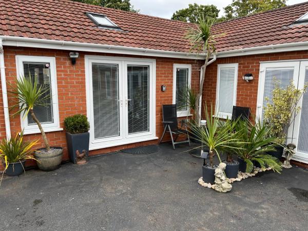 A la foto es mostra l'objecte Happy days Moreton , 2 miles from Hoylake Wirral situat a la ciutat de Moreton.