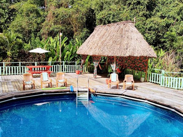 A la foto es mostra l'objecte Maya Mountain Lodge situat a la ciutat de Monkey Fall.
