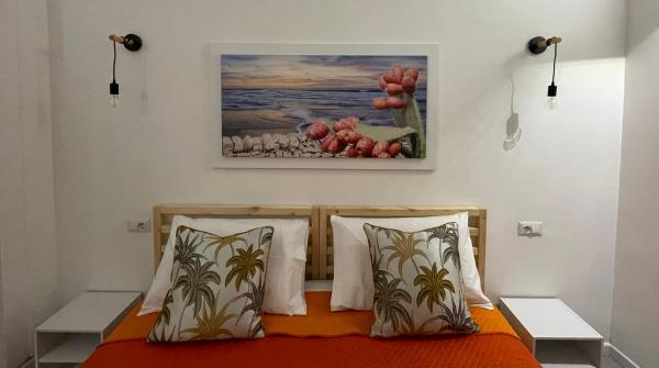 A la foto es mostra l'objecte My Happy Place Rooms situat a la ciutat de Palerm.