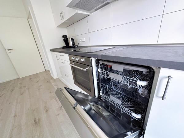 På billedet ses objektet City Apartment with WIFI, Kitchen and 4K TV beliggende i byen Essen.