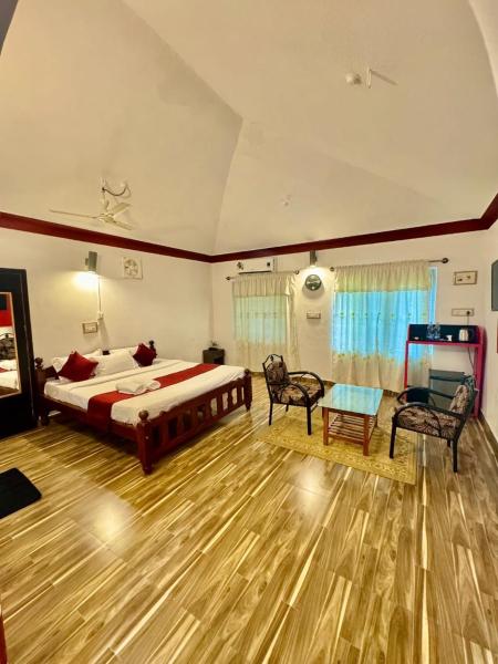 A la foto es mostra l'objecte Coorg Nest Cottages By Dreamy Vacations situat a la ciutat de Kushālnagar.