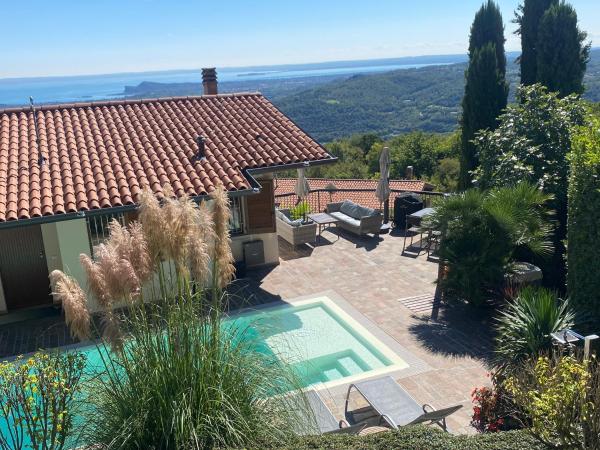 Nella foto è visibile l'oggetto Villa Rondine - Villa mit beheiztem Pool situato nella città di Salò.