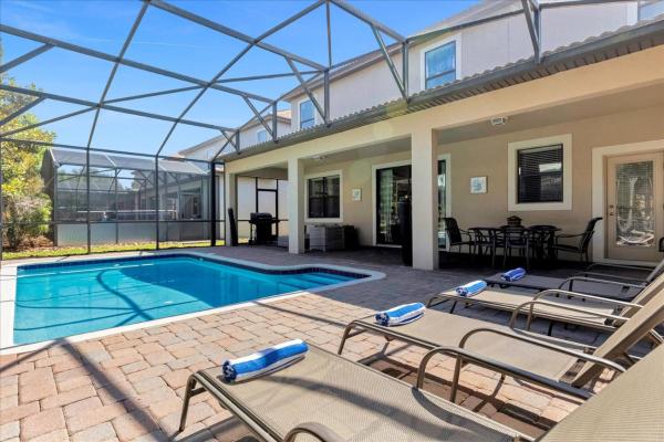 A la foto es mostra l'objecte Upstay Resort Mansion w Pool Games Room and BBQ situat a la ciutat de Davenport.