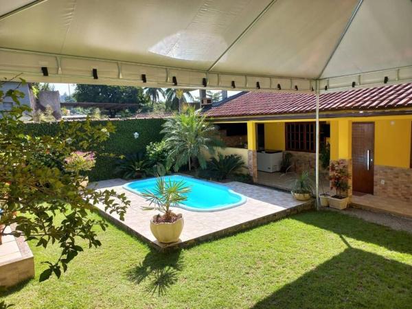 A la foto es mostra l'objecte Casa em bairro tranquilo em Nova Iguaçu, RJ situat a la ciutat de Iguaçu.