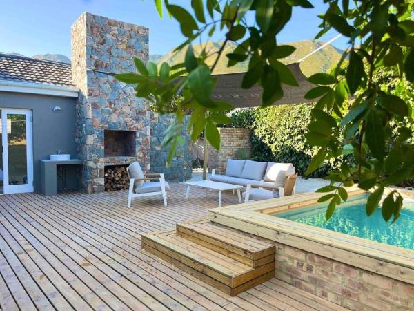 A la foto es mostra l'objecte Amazing Brand New Holiday Home with Pool! situat a la ciutat de Hermanus.
