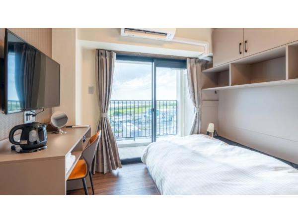A la foto es mostra l'objecte Hotel Airport View NAHA - Vacation STAY 02338v situat a la ciutat de Takara.