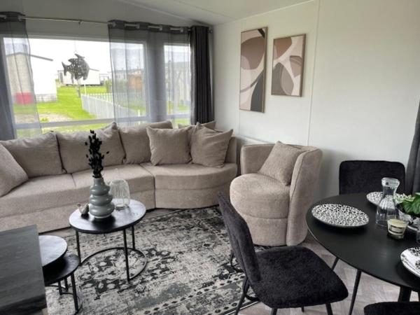 A la foto es mostra l'objecte Nr 90 Neues, ruhiges Ferienhaus direkt am Wattenmeer, hundefreundlich, komplett eingezäunt situat a la ciutat de Westerland.