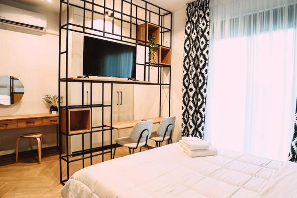 На фото показан объект Four Stay Apartments Blue Room, расположенный в городе Волос.