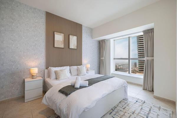 A la foto es mostra l'objecte Lux 2BR with Sea Views in Marina situat a la ciutat de Dubai.