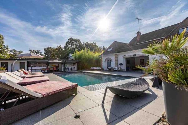 A la foto es mostra l'objecte Villa private avec piscine domaine golf open for 10 guests situat a la ciutat de Lamorlaye.