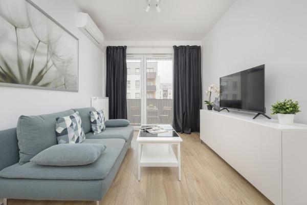 Στη φωτογραφία φαίνεται το αντικείμενο Comfy Two-Bedroom Apartment near Chopin Airport Warsaw's Ursynów by Noclegi Renters που βρίσκεται στην πόλη Βαρσοβία.