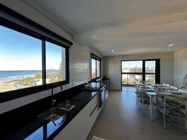 På billedet ses objektet IA01- 3 Quartos| 3 Banheiros| Vista Mar| Churrasq. beliggende i byen Itapoa.