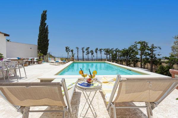 Na foto é possível ver o objeto Villa Ardith by Villa Plus localizado na cidade de Ragusa.