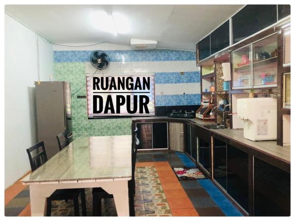 写真にはKampong Baru市にあるHomestay Pakcik Ayobが写っています。
