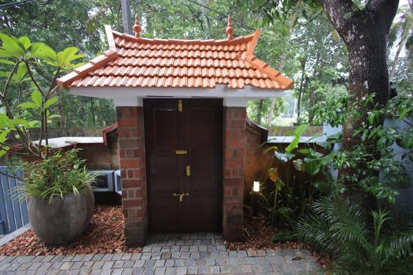 The photo shows the The Brick Cottage located in the city of Vempayam.
