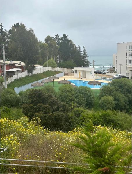 A la foto es mostra l'objecte Hermoso y tranquilo departamento frente al mar situat a la ciutat de El Tabo.