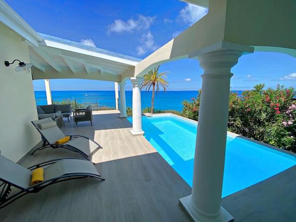 Op de foto is het object Villa Happy View - Vue mer paradisiaque - Piscine te zien, gelegen in de stad Happy Bay.