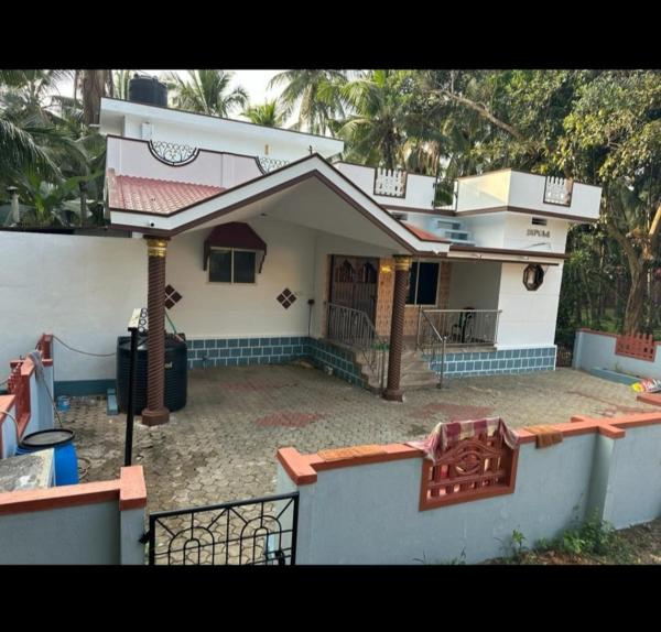 A la foto es mostra l'objecte Divya Homestay situat a la ciutat de Udupi.