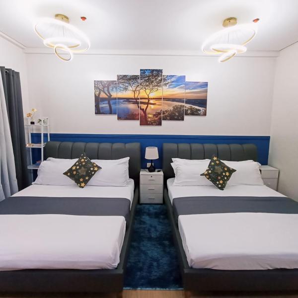 A la foto es mostra l'objecte Anne's Place at Hope Residences - SMDC Condo Beside SM Trece situat a la ciutat de Bitangan.