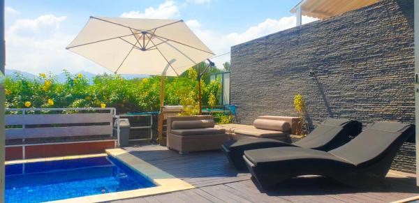 A la foto es mostra l'objecte Meninting Beach Villa, 3 bedroom situat a la ciutat de Ampenan.