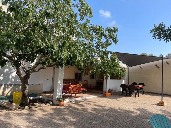 A la foto es mostra l'objecte El Refujio maison independante avec vraie piscine privée au sel chauffee pas de chlore situat a la ciutat de Godelleta.