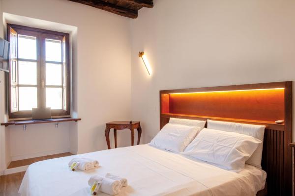 A la foto es mostra l'objecte [5 min Piazza Yenne] - Luxury Suite situat a la ciutat de Cagliari.