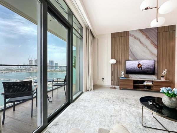 Billede 1: Trophy - 1BR Beachfront Retreat w Lagoon Views