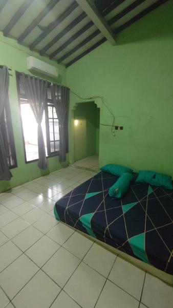 A la foto es mostra l'objecte Homey Kost 99 situat a la ciutat de Mlonggo.
