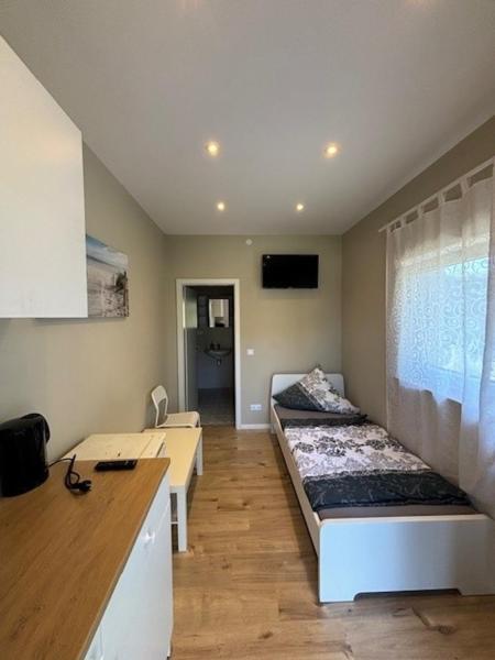 A la foto es mostra l'objecte M-one Apartment situat a la ciutat de Niederrodenbach.