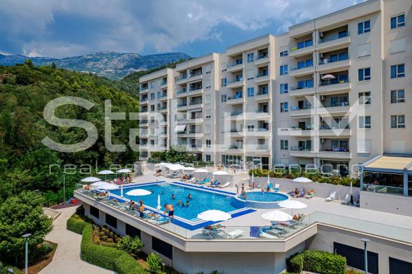 A la foto es mostra l'objecte Status-M Apartments 153 situat a la ciutat de Bečići.