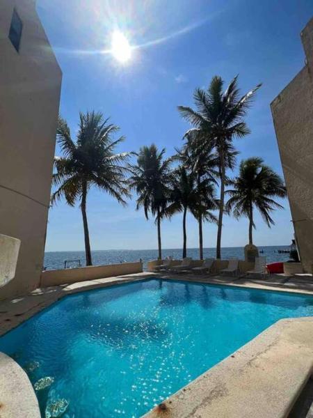 Beautiful Beachfront Apartment with Pool Relaxing Getaway, Cancún